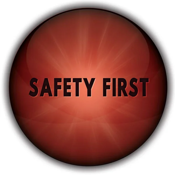 Veiligheid eerste rode knop badge. — Stockfoto