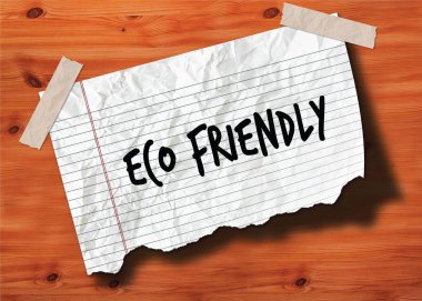 Eco dostu yırtık defter sayfası buruşuk Kağıt ahşap doku arka plan üzerinde el yazısı.