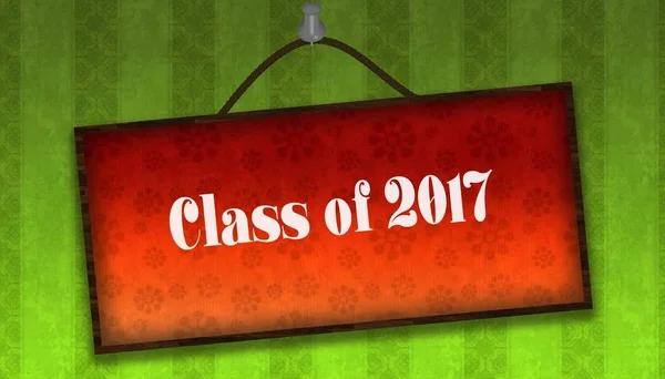 Текст CLASS OF 2017 року на висячій помаранчевій дошці. Зелена смугаста стіна — стокове фото