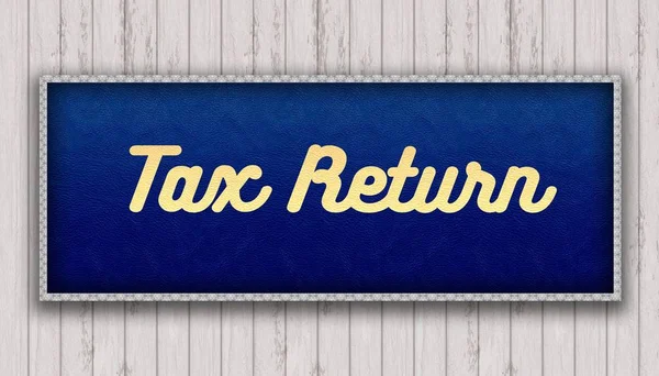 TAX RETURN handwritten on blue leather pattern painting hanging — Stock Photo, Image