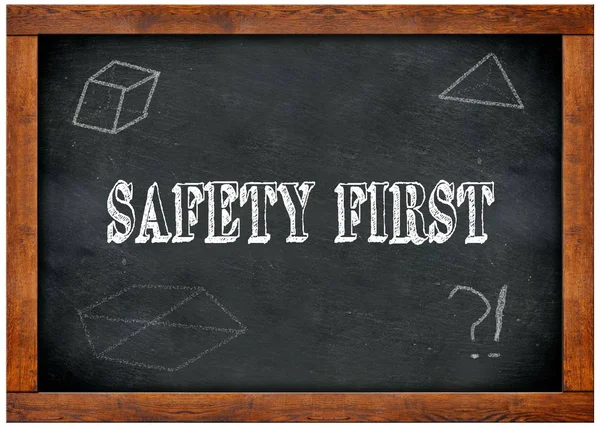 Houten frame schoolbord met Safety First tekst geschreven met krijt. — Stockfoto