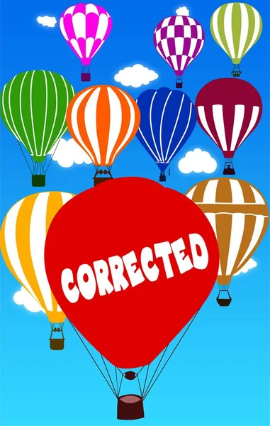 CORRECTED written on hot air balloon with a blue sky background. — Stock Photo, Image