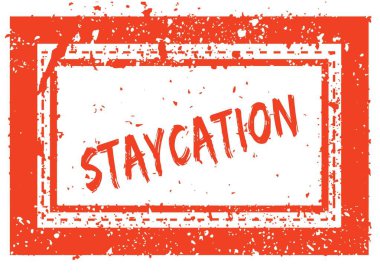 Turuncu kare çerçeve lastik damgası ile doku üzerinde Staycation