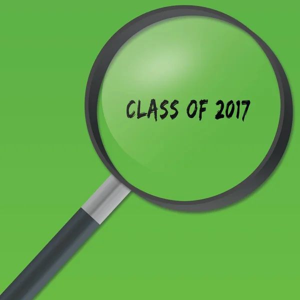 Klasse von 2017 Text unter der Lupe auf grünem Hintergrund. — Stockfoto