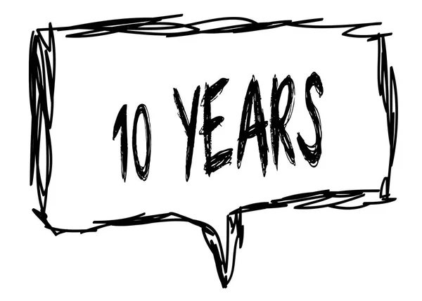 10 ANS sur un écriteau dessiné au crayon . — Photo