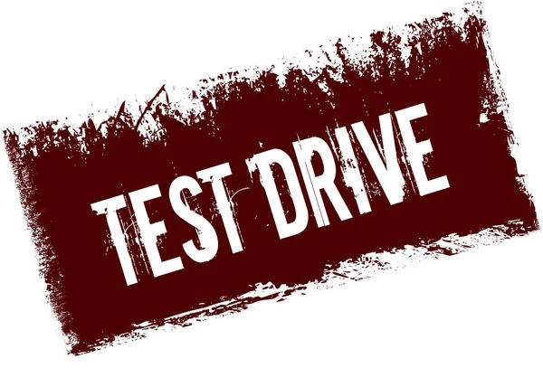 TEST DRIVE on red retro distressed background. — Stock Photo, Image