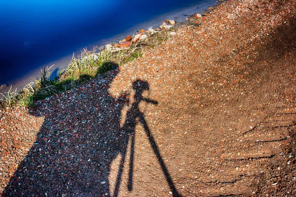 Fotógrafos sombra al mediodía — Foto de Stock