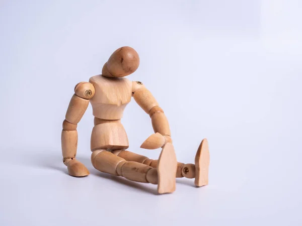 The wooden dummy sits on white background — 스톡 사진