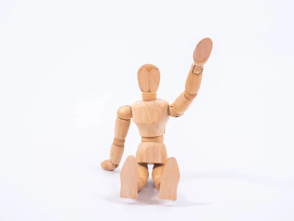 The wooden dummy sits on white background — 스톡 사진