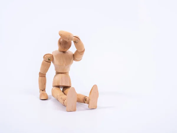 The wooden dummy sits on white background — 스톡 사진