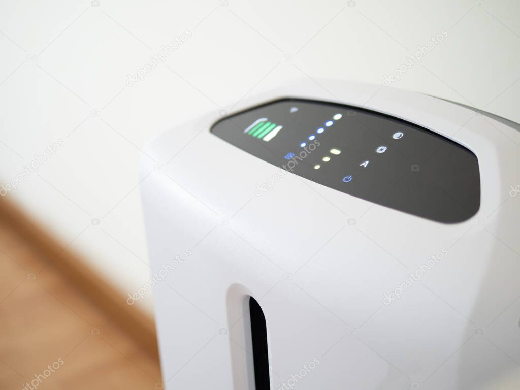 air purifier in bed room. air cleaner removing fine dust in hous