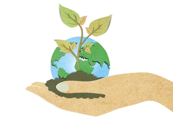 手リサイクルペーパークラフト付き緑の葉 — ストック写真