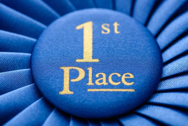 Winners blue first place rosette — Stock Photo, Image