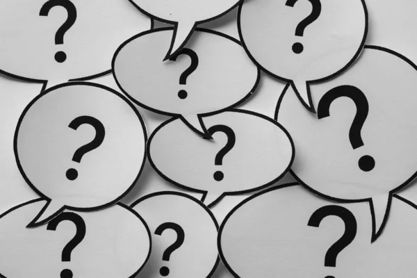 Full frame background of speech bubbles with question marks — Stock Photo, Image