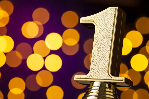 Ist place winners award trophy with gold number — Stock Photo, Image