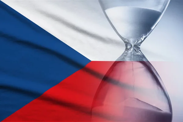 Hourglass over the flag of the Czech Republic — Stok fotoğraf