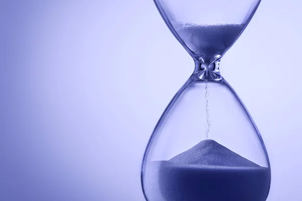 Blue Toned Hourglass Running Sand Measuring Passage Time Deadline Countdown — Stock Photo, Image
