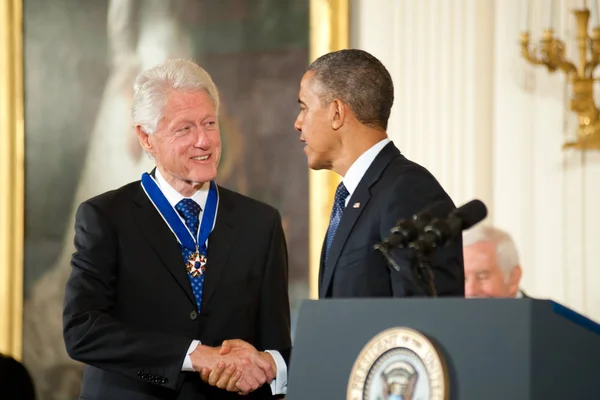 Президенты Билл Клинтон и Барак Обама — стоковое фото