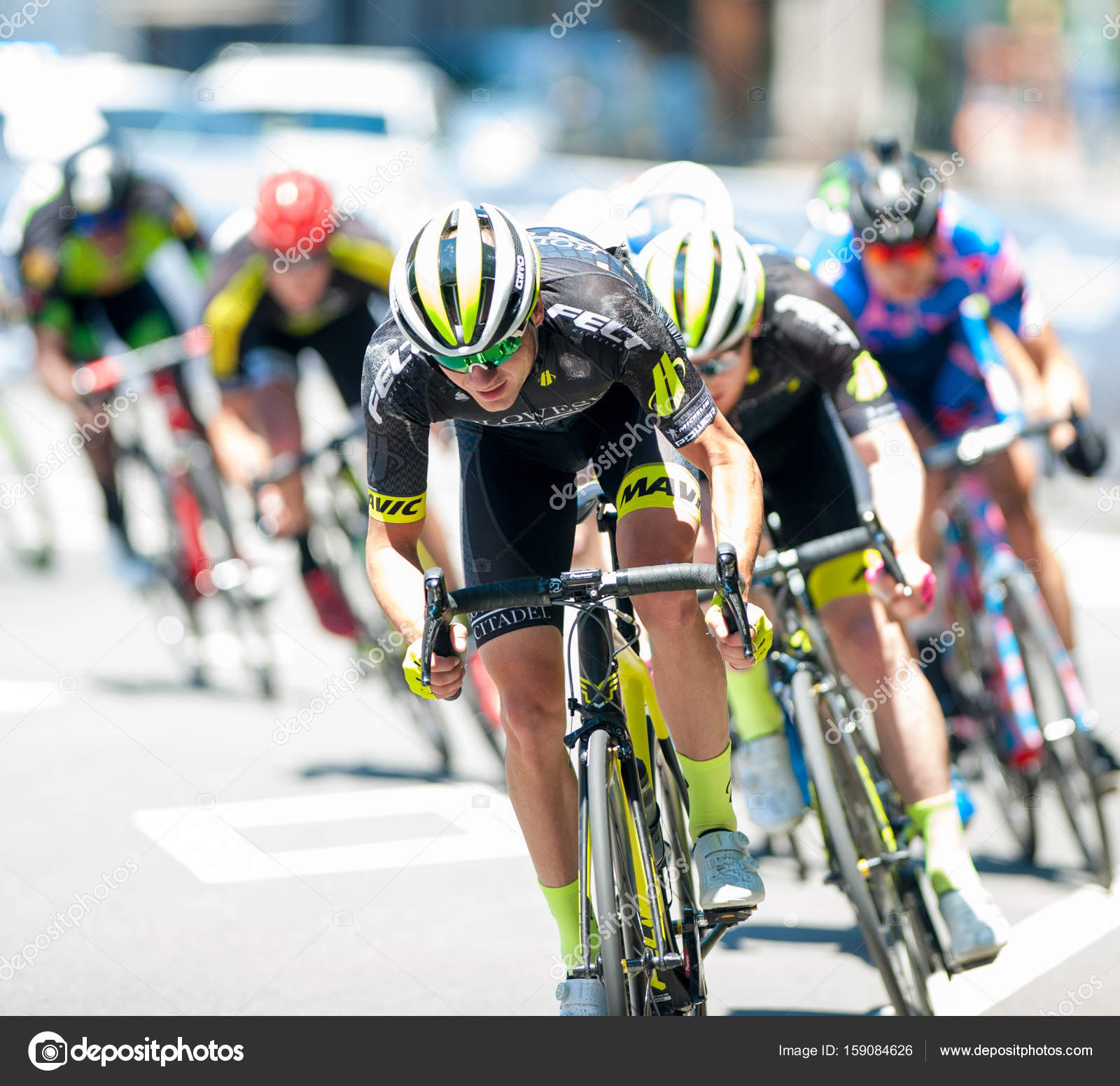 Elite men cyclists in competition Stock Editorial Photo © renaschild