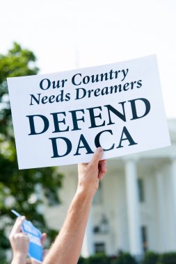 Protesting the end of DACA clipart