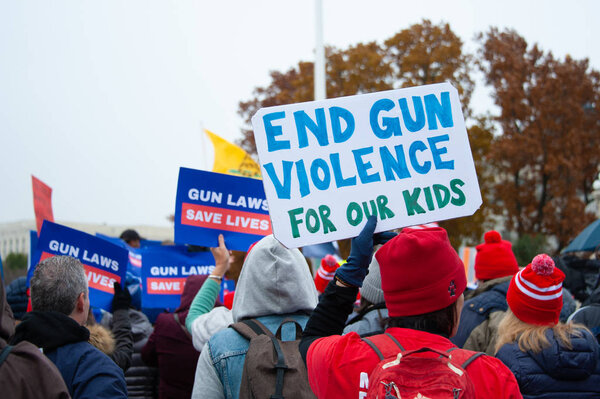 Participants in the Gun Laws Save Lives Rally, a protest against the weakening of gun laws, on December 2, 2019 at the U.S. Supreme Court in Washington DC 