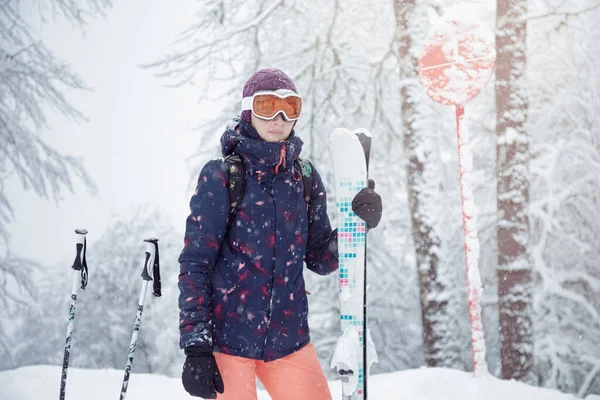 Young Female Skier Standing Ski Slope Snowfall Holding Ski Poles — Stock Photo, Image