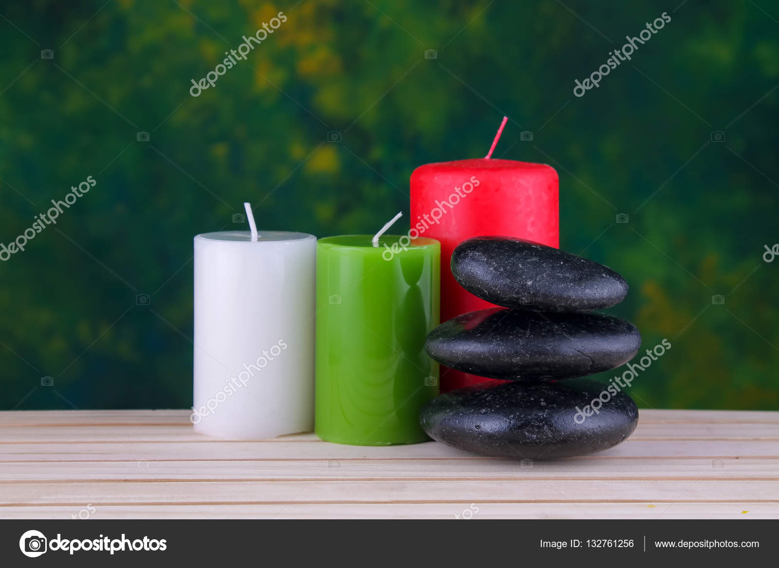 zen basalt stones and candles on the wood stock photo jibamjr