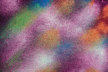 Soyut çok toz, siyah arka plan üzerinde renkli