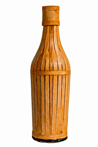 Old bottle wrapped in wicker — Stock Photo, Image