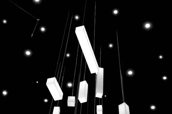 Абстрактные белые огни и геометрические формы на темном фоне — стоковое фото