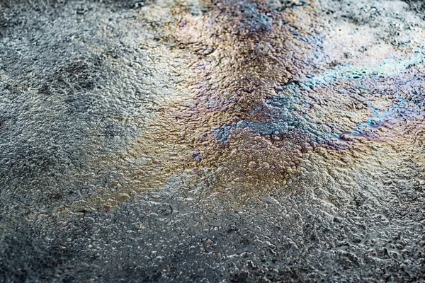 Oil stain on Asphalt road after rain — Stock Photo, Image