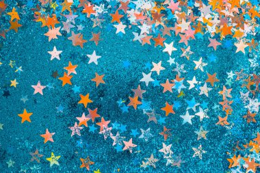 mavi ışıltılar ve çok renkli yıldızlar arka plan