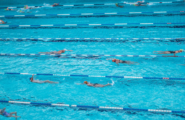 Athens, Greece - February 17, 2020. swimmers at the outdoor pool training