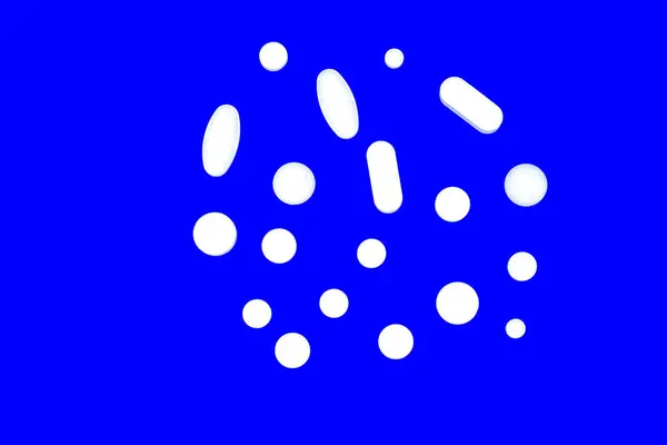 White Pharmaceutical Pills Blue Background — Stock Photo, Image