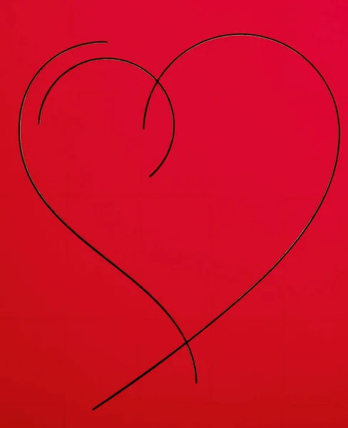 graphic dark line heart on red background