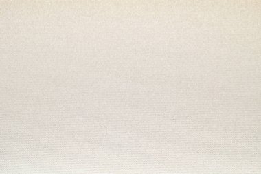 Kalıplı yüzeyi olan yoğun bir endüstriyel kağıt tabakası.