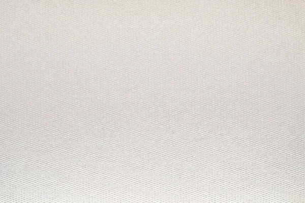 Kalıplı yüzeyi olan yoğun bir endüstriyel kağıt tabakası.