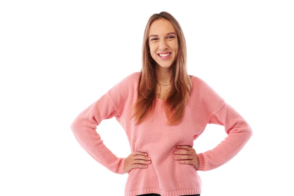 Elated teenager standing in a confident pose with her hands on h — Stock Photo, Image