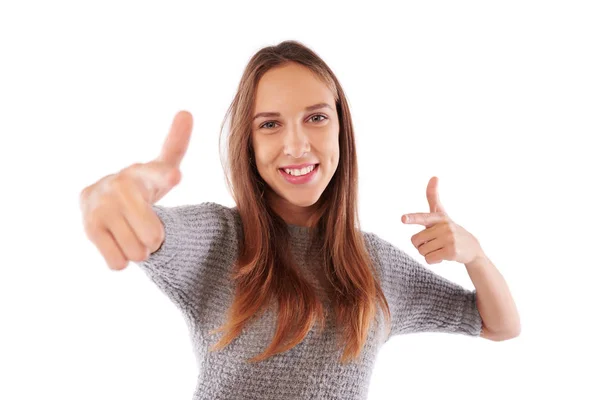 Enthusiastisches junges Mädchen zeigt mit dem Finger auf die Kamera — Stockfoto