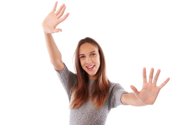 Happy opgewonden lachende meisje tonen twee open palmen op de camera — Stockfoto