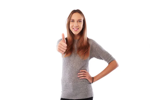 Menina bonita está sorrindo e dando o polegar isolado no branco — Fotografia de Stock