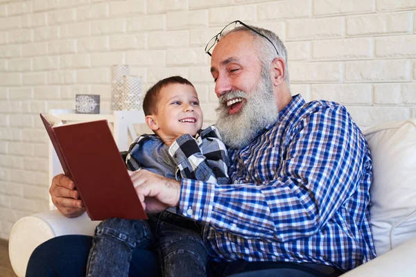Smiling grandpa with his grandson enjoy  their time — Stock Photo, Image