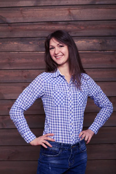 Energetic girl posing with hands on hip looking sideways — Stock Photo, Image