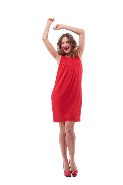 Cheerful woman with hands above head posing at the camera — Stock Photo, Image