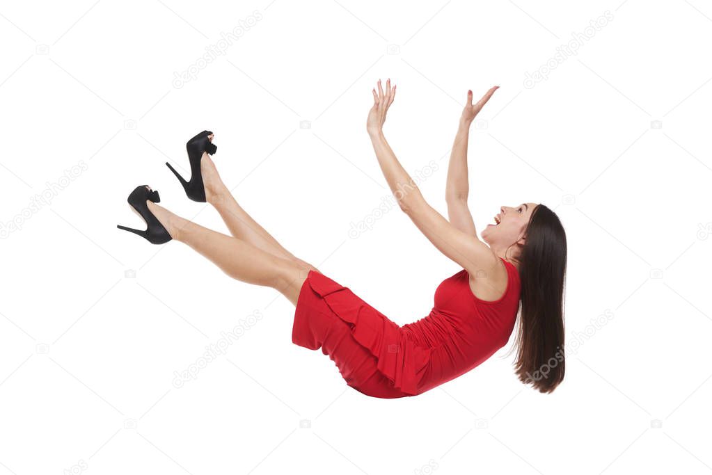 Female in red dress falling down 