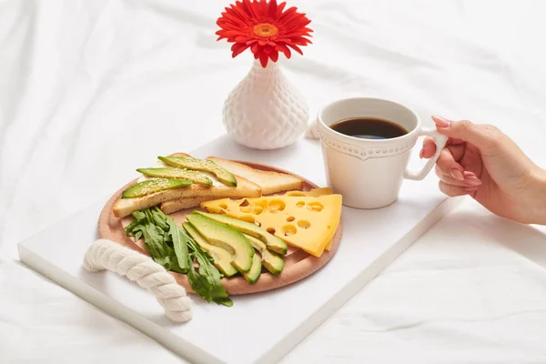 Bed breakfast with coffee, juicy avocado and cheddar — Stock Photo, Image