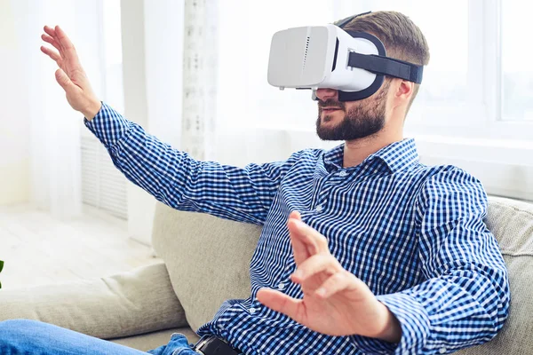 Concentrated gentleman with beard working in virtual reality gla — Stock Photo, Image