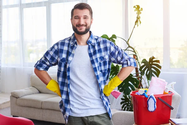 Happy man being pride of finishing cleaning works — Stock Photo, Image