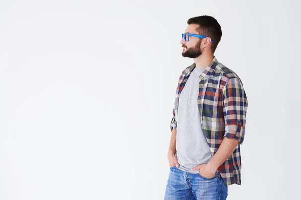 Side view of serious bearded man looking sideward at copy space — Stock Photo, Image