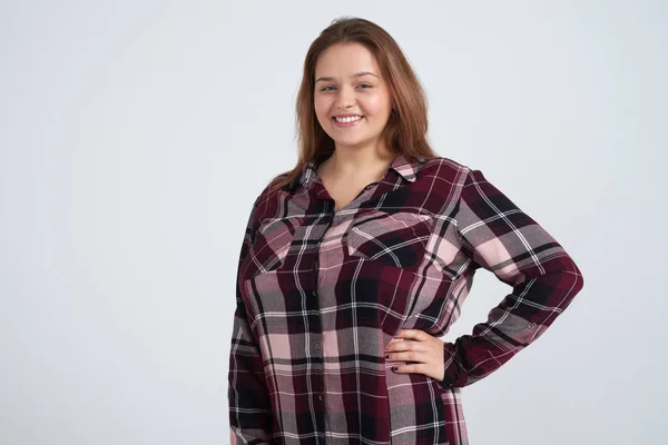 Attractive young girl posing against background — Stock Photo, Image